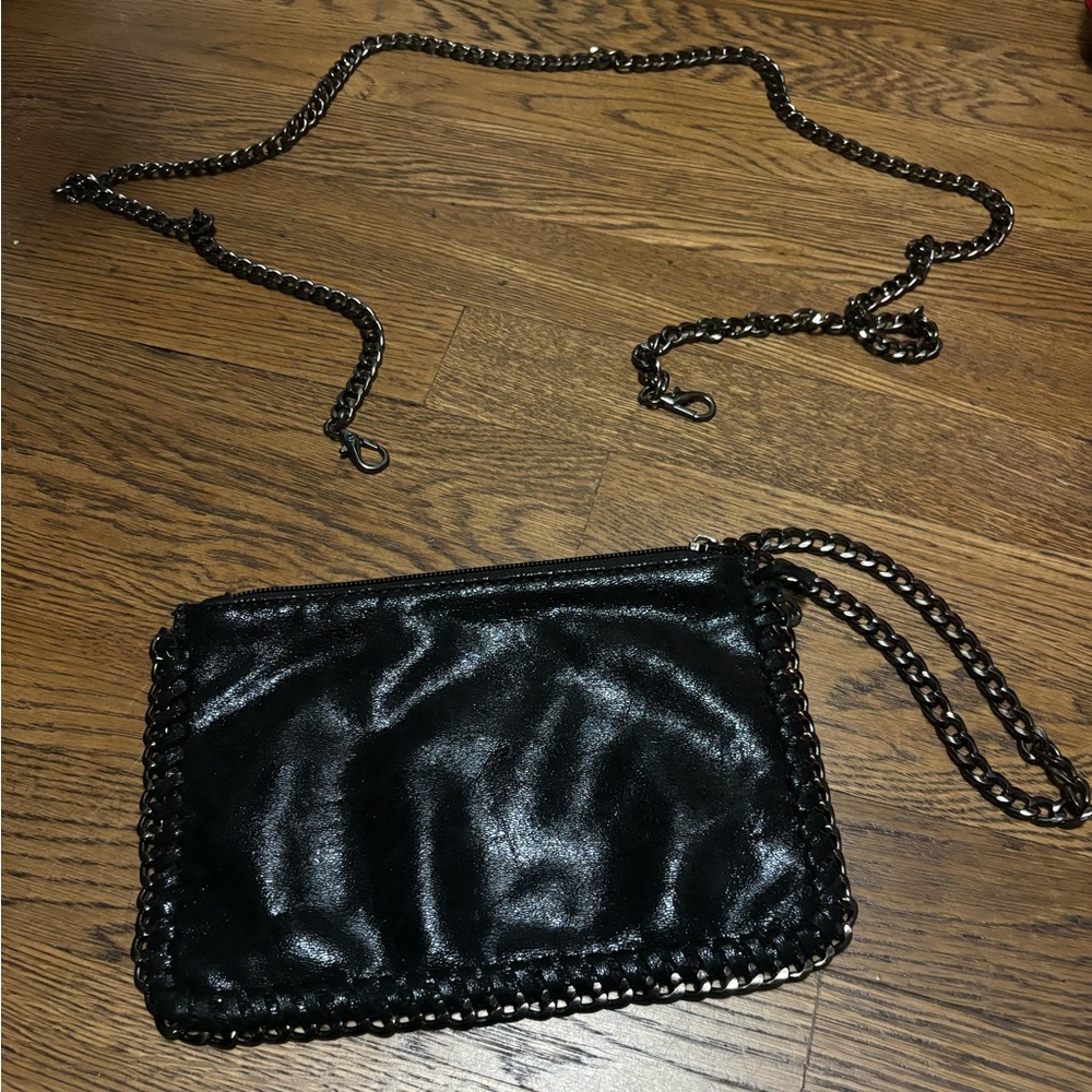 Black evening bag. Beautiful speckled material with gunmetal grommets and chains